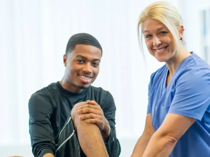 Therapist providing hands-on treatment to calm pain
